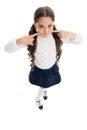 Keep silence. Strict school rules. September time to study. Girl cute pupil on white background. School uniform. Back to