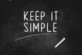 KEEP IT SIMPLE    written with chalk on blackboard icon logo design vector illustration Royalty Free Stock Photo