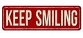 Keep smiling vintage rusty metal sign Royalty Free Stock Photo