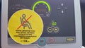 Keep social distance warning sticker on digital display of treadmill gym equipment