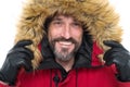 Keep your head snug in cosy hood. Happy man wear parka hood. Mature man smile in faux fur hood. Fashion trends for