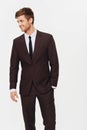 Keeping business fashionable. Studio shot of a handsome young businessman dressed in a suit and smiling.