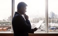 Keeping business thriving under his command. a mature businessman using a digital tablet in an office. Royalty Free Stock Photo