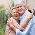 Keeping the love alive. Portrait of a happy elderly couple embracing each other.