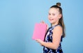 Keeping secrets here. design expert. pr-specialist. small girl with pink note book. school child with notepad. workbooks Royalty Free Stock Photo