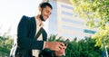 Keeping you connected on every business trip. a handsome young businessman using his cellphone while commuting to work