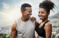 He keeps me motivated. a sporty young couple exercising together outdoors. Royalty Free Stock Photo