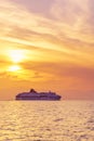 Commercial ferry passing Kefalonia island at sunset Royalty Free Stock Photo