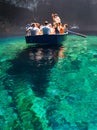 Kefalonia, Greece. September 2017: Tour by boat tourists in a cave with an underground lake Melissani