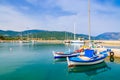 Traditional Greek fishing boats in port of Sami village on Kefalonia island, Greece Royalty Free Stock Photo