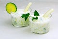 Kefir, ayran, yoghurt with vegetables and greens in glasses