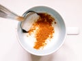 Kefir with cinnamon in a mug for boost the immune system. Immunological and stomach benefits, prevents illness and weight loss. Royalty Free Stock Photo