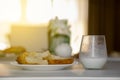 Kefir, sour milk, yoghurt from natural country cow's milk. Organic breakfast is healthy. A glass of yogurt and bread on