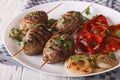 Kefte kebab with grilled vegetables on a plate close-up. horizon Royalty Free Stock Photo