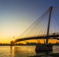 KEHL, GERMANY - MARCH 24, 2018: The Mimram Two-bank footbridge at sunset. This cable-stayed bridge considered as a modern artwork