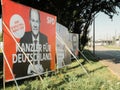 City street with election posters with the chancellor candidates of SPD with