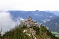 Kehlsteinhaus, Eagle Nest, Berchtesgaden in Germany, history place beautiful landscape on mountain peak with mist, cloudy Royalty Free Stock Photo