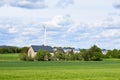 a farm with wind power plants and solar panels Royalty Free Stock Photo