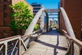 Kehrwiedersteg bridge leading through the historical Speicherstadt, Hamburg, Germany