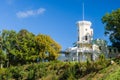 Keila-Joa manor (Schloss Fall) on hillside against blue sky Royalty Free Stock Photo