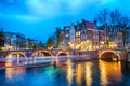 Keizersgracht bridge view of Amsterdam canal and historical houses during twilight time, Netherland