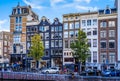 The Keizersgracht Emperor`s Canal with its cafe terraces and large historic houses in the historic center of Amsterdam