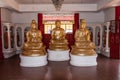 Three seated Buddhas in the Kek Lok Si Temple, the ornate Buddhist temple, Penang Island, Malaysia