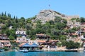 Kekova, Turkey- 2 Jun 2017: Coast of the island in the Mediterranean sea, modern picturesque village with the ruins