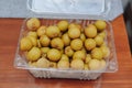 Kelengkeng or longan fruit, one of tropical fruit that has sweet taste, served in a plastic box Royalty Free Stock Photo