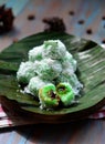 kelepon or klepon made from glutinous rice flour and filled with brownn sugar covered with grated coconut. indonesian food.