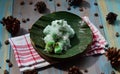 kelepon or klepon made from glutinous rice flour and filled with brownn sugar covered with grated coconut. indonesian food.