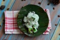 kelepon or klepon made from glutinous rice flour and filled with brownn sugar covered with grated coconut. indonesian food