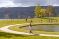 Pedestrians and Cyclists at Waterfront Park in Kelowna, BC, Canada Royalty Free Stock Photo