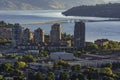 Kelowna British Columbia skyline and Okanagan Lake with the R W Bennett Bridge from Knox Mountain at sunset Royalty Free Stock Photo