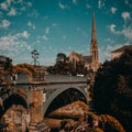 Kelvin Bridge over river kelvin in Glasgow summer 2020 with blue skies and church steeple Royalty Free Stock Photo