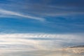 Kelvin, Helmholtz instability clouds wavy on blue sky, feathery curls Royalty Free Stock Photo