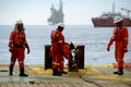 Marine crew working on deck during anchor handling operation