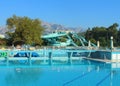 Kemer, Turkey - August 23, 2020: Water park and swimming pool at resort, outdoor aquapark at Daima Biz hotel with water slides. Royalty Free Stock Photo