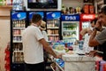 Kemer, Turkey - May 25, 2021: Turkish souvenir shop. Customers at the checkout pay for purchases