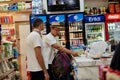 Kemer, Turkey - May 25, 2021: Turkish souvenir shop. Customers at the checkout pay for purchases