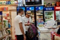 Kemer, Turkey - May 25, 2021: Turkish souvenir shop. Customers at the checkout pay for purchases