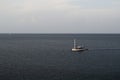 KEMER, TURKEY - MAY 07, 2018: the white boat sails on the Mediterranean sea Royalty Free Stock Photo