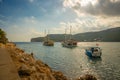 KEMER, TURKEY: Sea and rocks, parking of yachts and ships near Yoruk park. Royalty Free Stock Photo