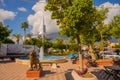 KEMER, TURKEY: White clock tower stands on the Central square of the city of Kemer in Turkey.