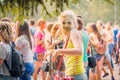 Kemerovo, Russia, June 24, 2018: young girl painted in colored powder at holi festival of colors