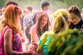 Kemerovo, Russia, June 24, 2018: young girl painted in colored powder at holi festival of colors