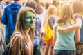 Kemerovo, Russia, June 24, 2018: young girl painted in colored powder at holi festival of colors