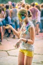 Kemerovo, Russia, June 24, 2018: young girl painted in colored powder at holi festival of colors