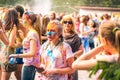 Kemerovo, Russia, June 24, 2018: young girl painted in colored powder at holi festival of colors