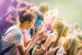 Kemerovo, Russia, June 24, 2018: Young girls painted in colored powder